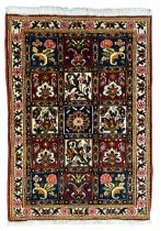 Persian Bakhtiari crimson ground rug