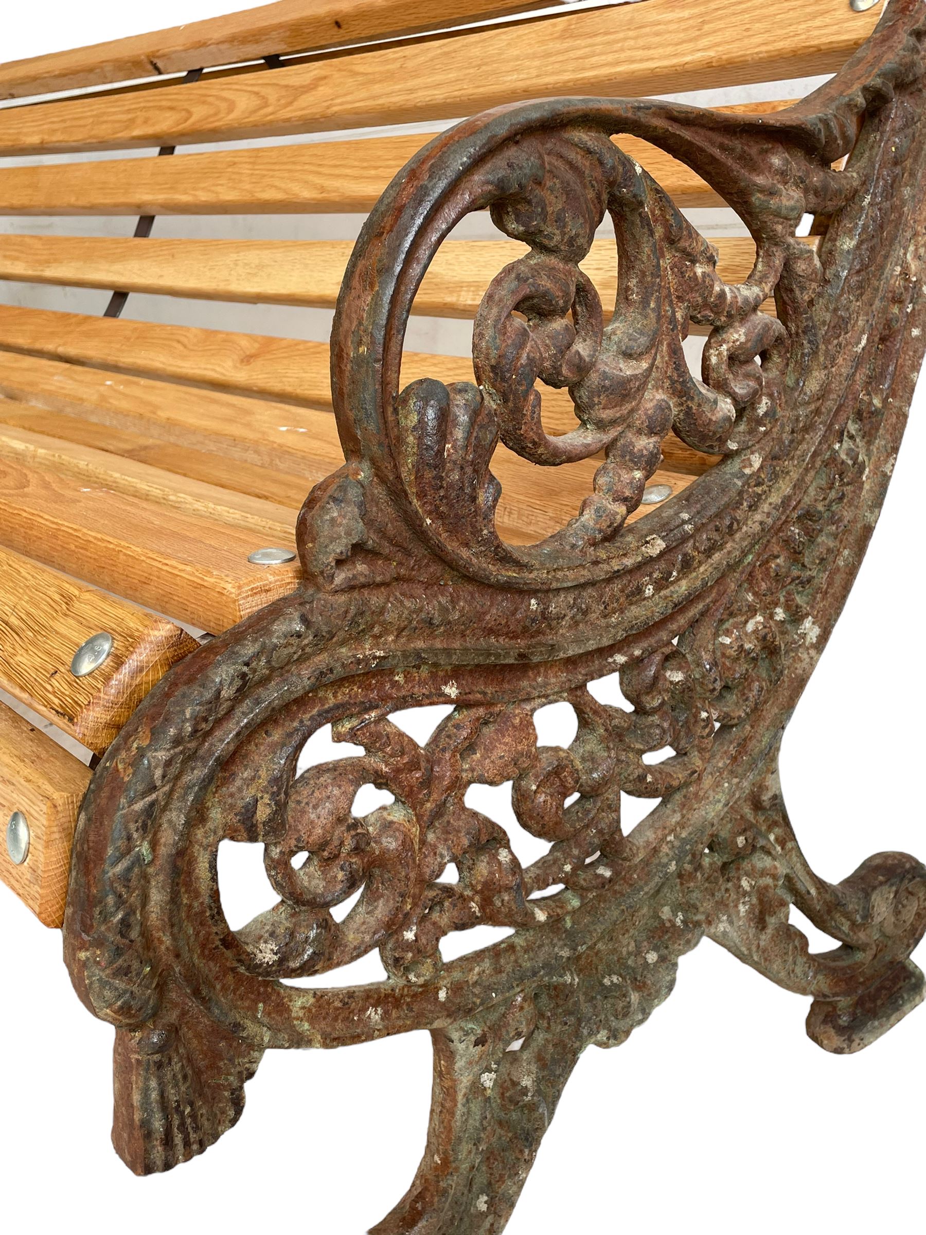 Victorian cast iron and oak slatted garden bench - Image 7 of 11