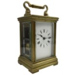 Late 19th century French 8-day striking carriage clock with a rack strike repeat on a gong - in an