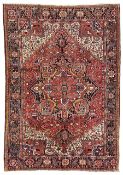 Persian Heriz crimson ground carpet