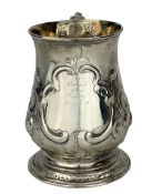 Early George III silver baluster mug with later embossed decoration and inscription