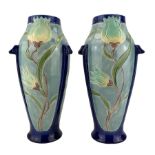 Pair of Burmantofts Faience three-handled vases