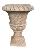 Polished granite Campana shaped garden urn on base