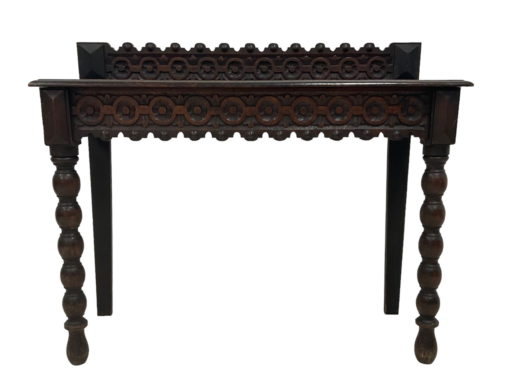 Late 19th century gothic revival oak side table the raised back carved with repeating rosette and fl - Image 2 of 5