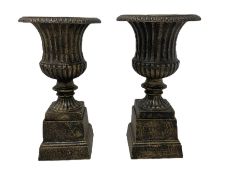 Pair Victorian design cast iron Campana shaped garden urns with base