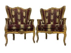 Pair Louis XV design gilt framed wingback armchairs