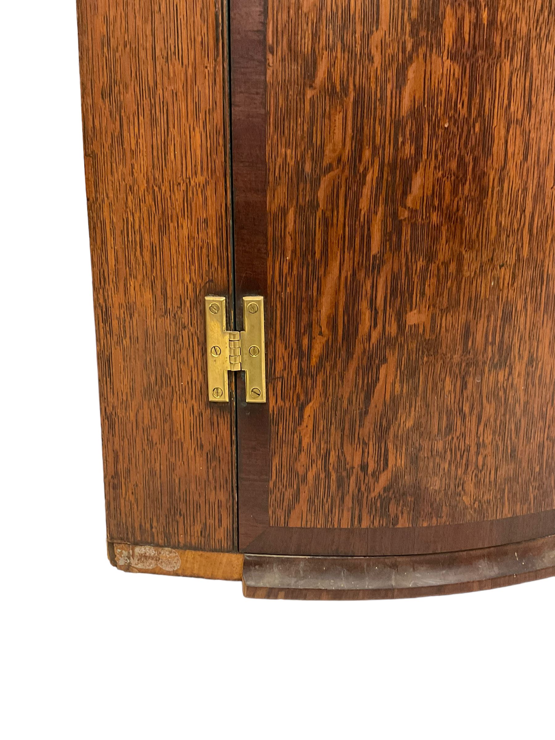 Early 19th century oak and mahogany banded bow-front corner cupboard - Image 2 of 5