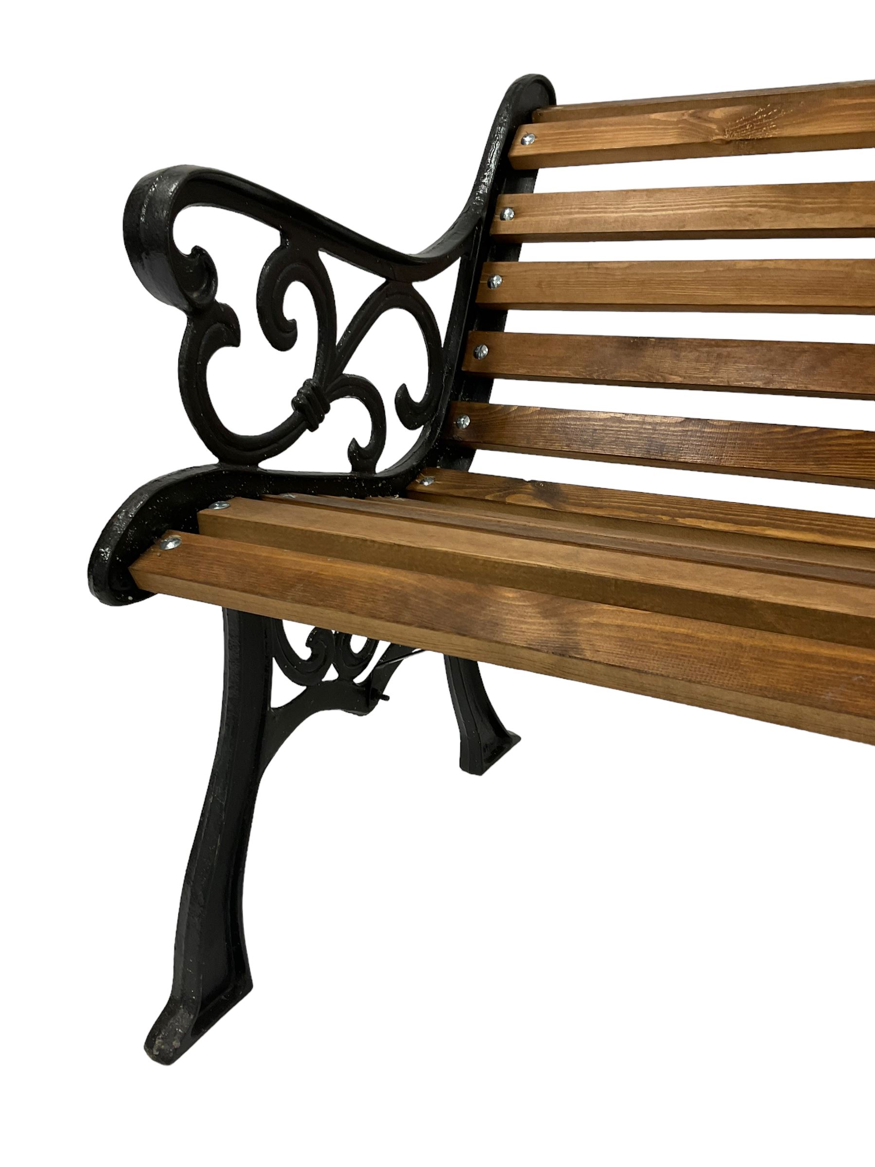 Black painted cast iron and wood slated garden bench - Image 3 of 4