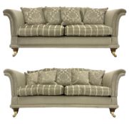 Large pair traditional design drop-arm two seat sofas
