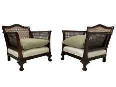 Pair of early to mid-20th century walnut framed bergere armchairs