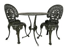Cast metal garden set - circular table with pierced foliate decoration on triform base (W70cm H65cm)