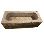 Hewn granite trough or garden planter