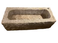 Hewn granite trough or garden planter