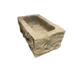 Hewn granite trough or garden planter