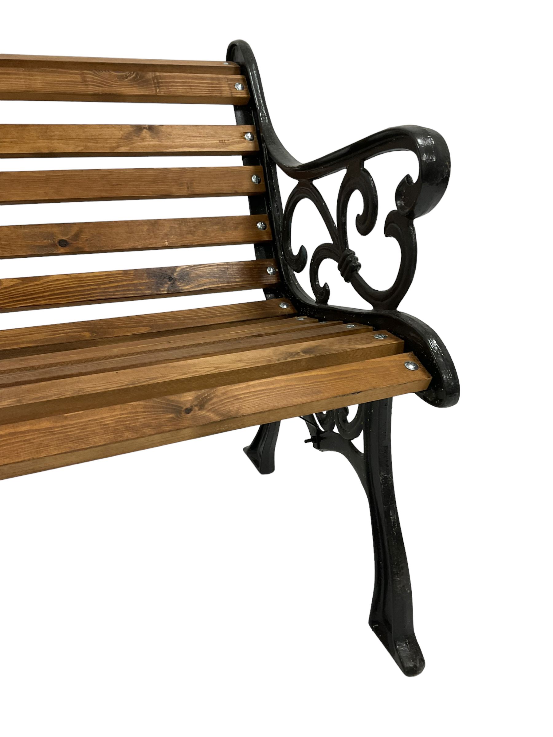 Black painted cast iron and wood slated garden bench - Image 2 of 4