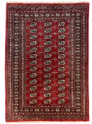 Persian Tekke Bokhara crimson ground rug