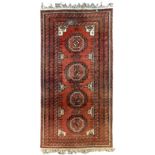 Antique Afghan Baluchi red ground rug