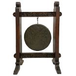 Late 19th century carved oak frame gong on stand