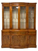 Yew wood shaped break-front display cabinet