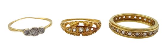 Gold white stone set full eternity ring and two gold diamond set rings