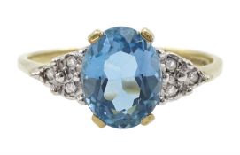 9ct gold oval blue topaz and diamond ring