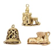 Three 9ct gold pendant/charms including just married boot