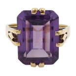 Gold single stone emerald cut synthetic alexandrite ring