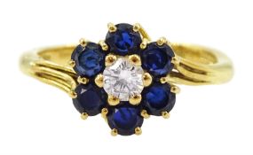 18ct gold round brilliant cut diamond and sapphire cluster ring