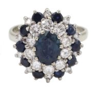 White gold sapphire and diamond cluster ring