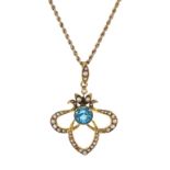 Edwardian gold blue zircon and seed pearl pendant