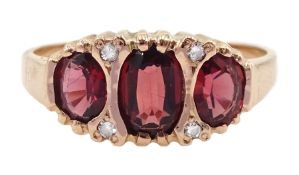 9ct rose gold oval garnet and diamond ring