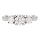 Platinum three stone round brilliant cut diamond ring