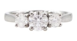 Platinum three stone round brilliant cut diamond ring