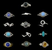 Thirteen silver and stone set silver rings including moonstone