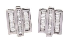 Pair of 14ct white gold baguette and round brilliant cut diamond stud earrings