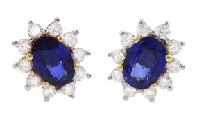 Pair of 18ct gold oval cut sapphire and round brilliant cut diamond cluster stud earrings