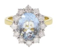 18ct gold oval aquamarine and round brilliant cut diamond cluster ring