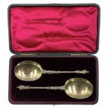 Pair of late Victorian silver serving spoons with gilded bowls