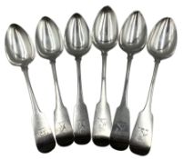 Three George III Irish silver fiddle pattern tablespoons with crest and monogram to the reverse Dub