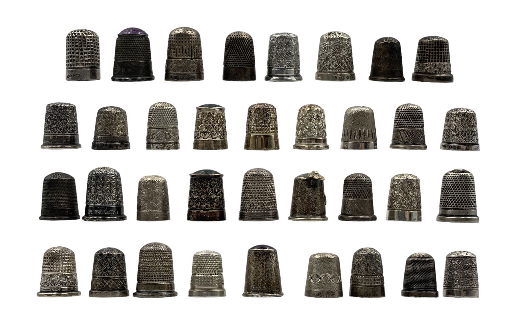 Collection of thirty-five Victorian and later silver thimbles