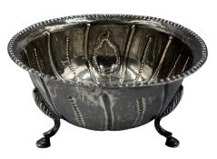 Early 19th century Irish silver circular bowl of fluted and beaded design on triple shaped supports