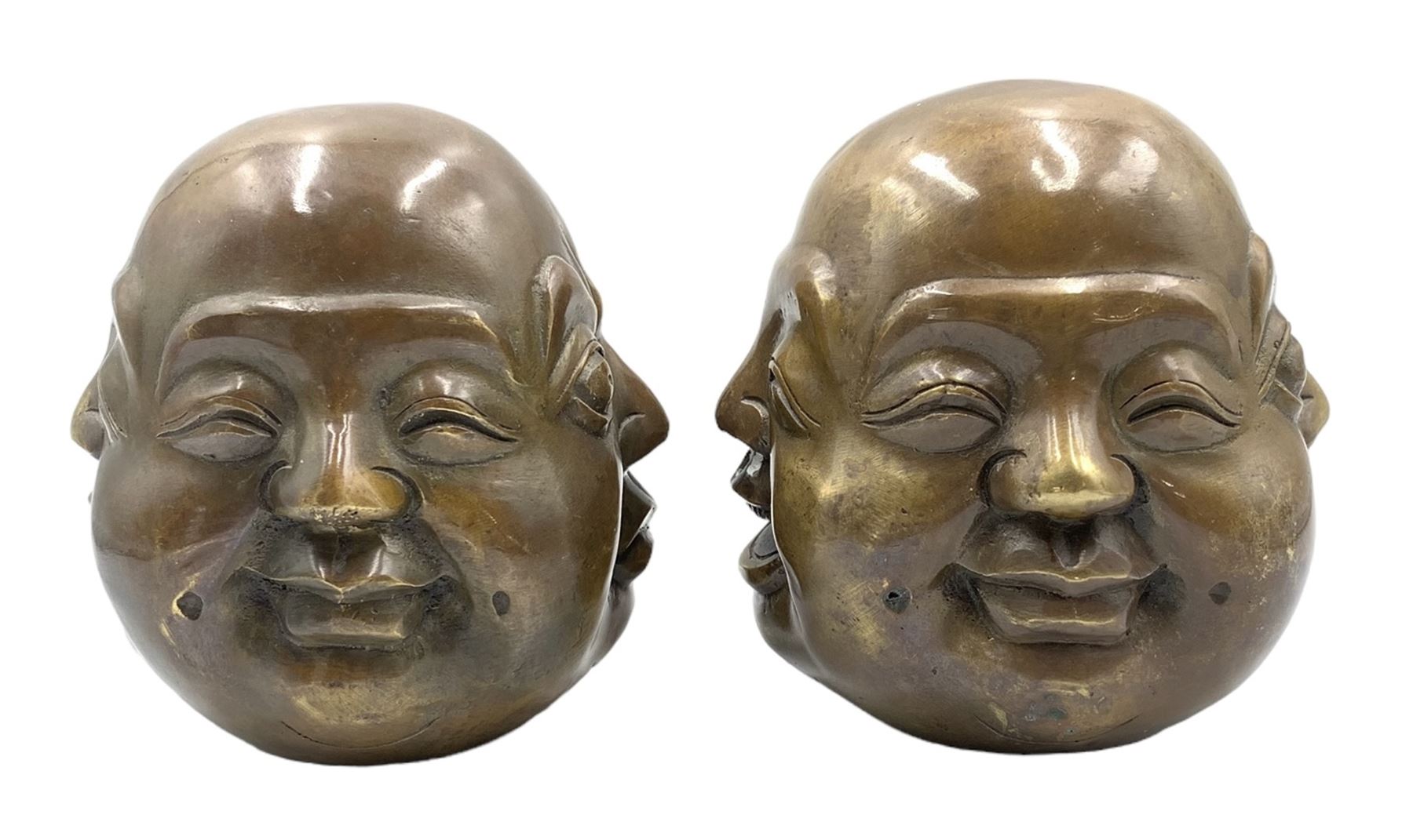 Two Chinese bronzed four-faced Buddha heads