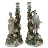 Pair of late 19th/ early 20th century Sitzendorf candlesticks modelled as a galllant and his lady an