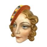 Art Deco Czech wall mask modelled as a lady wearing an orange hat