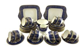 Wedgwood tea set decorated in powder blue and gilt comprising twelve cups