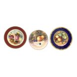 Cabinet plate painted with fruit by James Skerrett with a dark blue and gilt border D28cm