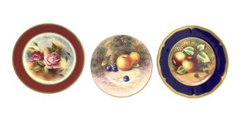 Cabinet plate painted with fruit by James Skerrett with a dark blue and gilt border D28cm