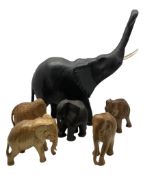 Large ebonised African elephant with bone tusks and raised trunk H66cm and five smaller African and