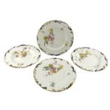 Set of four late Victorian Royal Crown Derby plates each painted with Spring flowers within a moulde