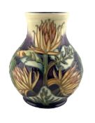 Moorcroft 'Burdock' pattern baluster vase designed by Phil Gibson H16cm